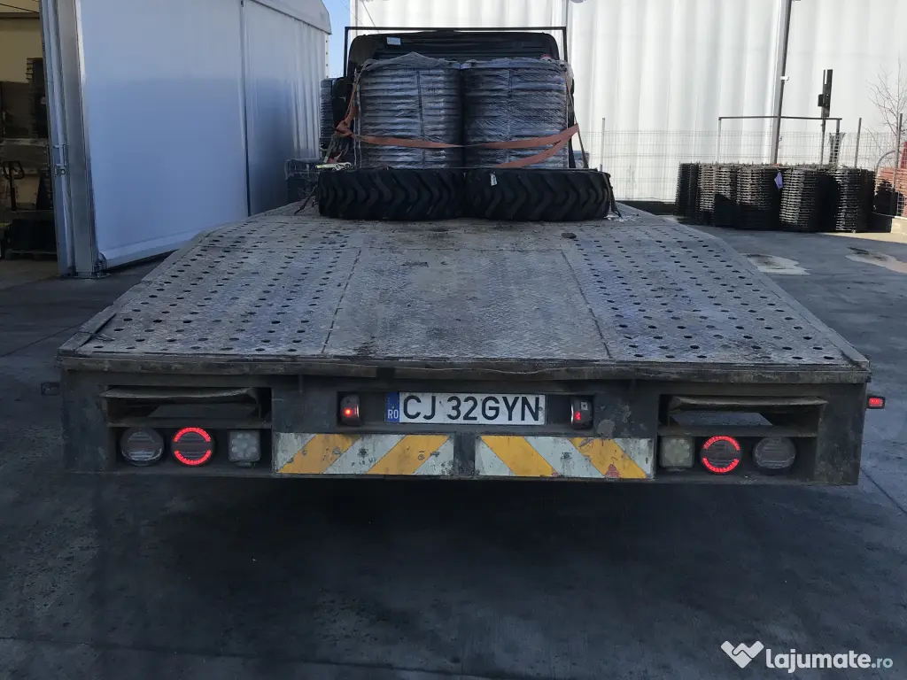 Tractez,transport autovehicule,utilaje in toata tara cu platforme auto 