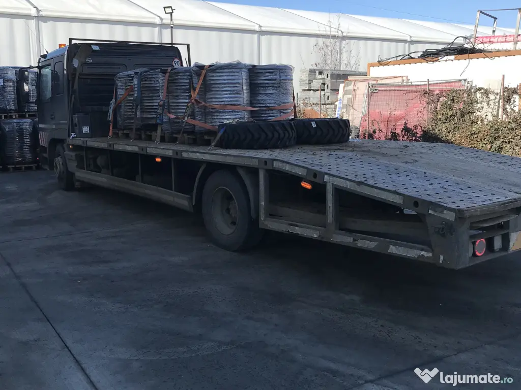 Tractez,transport autovehicule,utilaje in toata tara cu platforme auto 