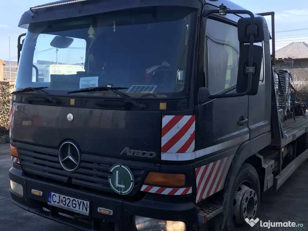 Tractez,transport autovehicule,utilaje in toata tara cu platforme auto 