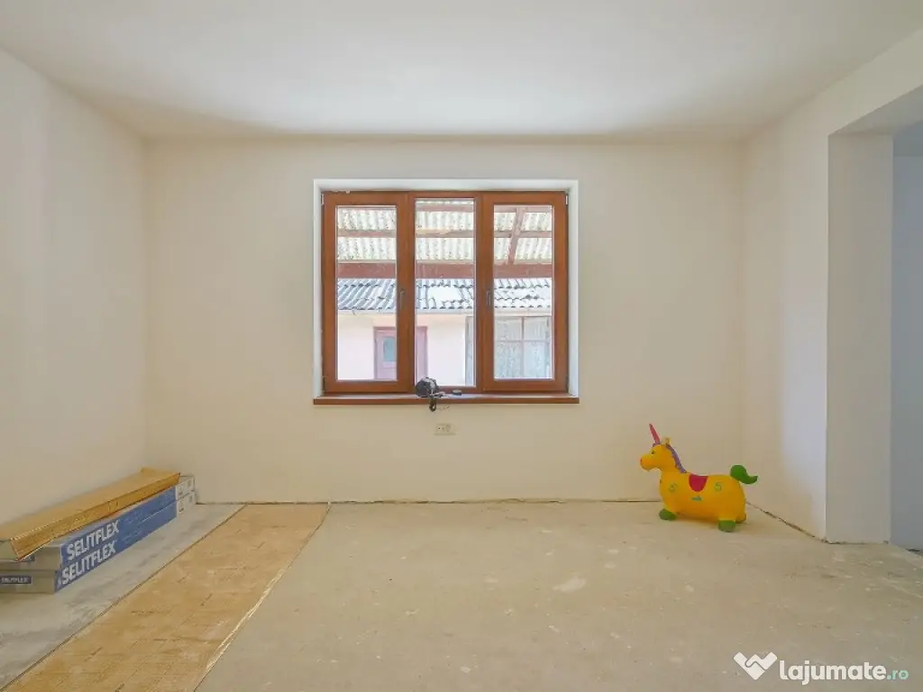Casă renovată în Feldioara cu încălzire în pardoseală