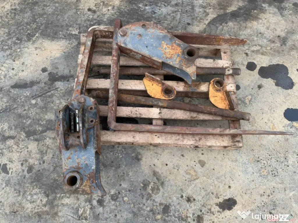 Furci originale pentru buldoexcavator - set complet 