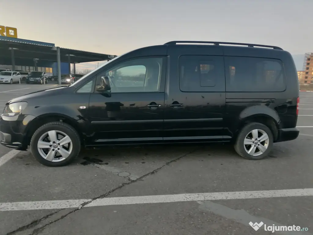 Vand Volkswagen Caddy Maxi  fabricatie 2012 cu rampa 