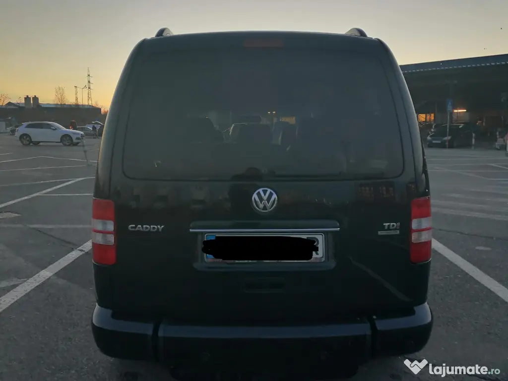 Vand Volkswagen Caddy Maxi  fabricatie 2012 cu rampa 