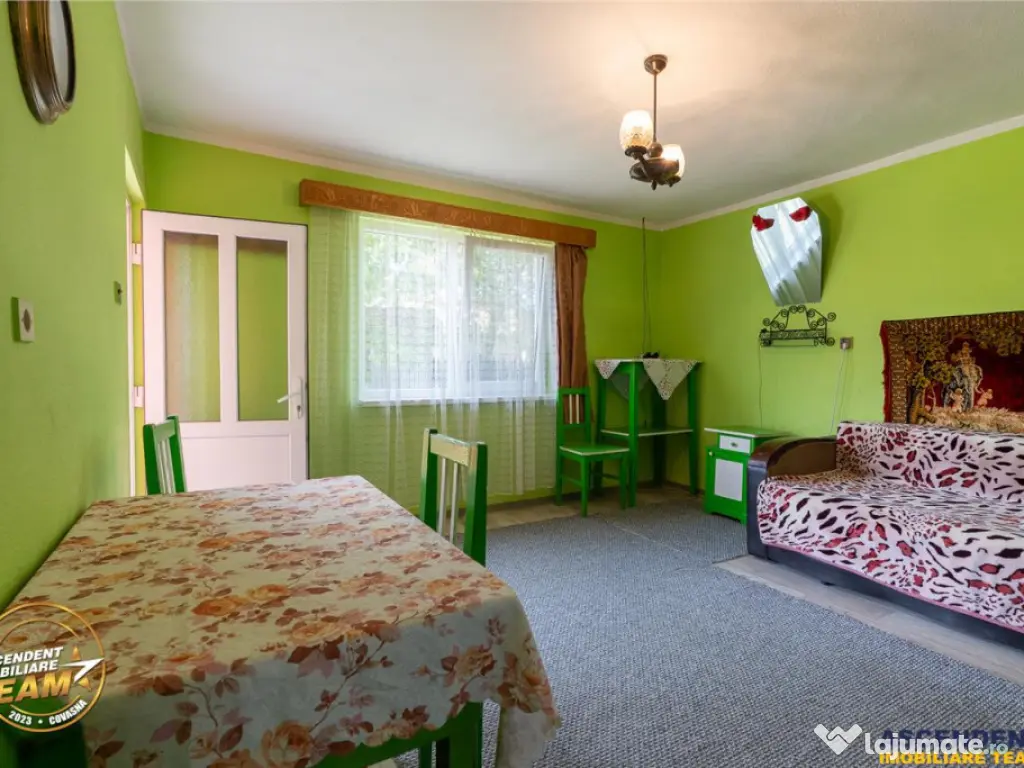 FILM! Pe 1.200mp teren rezidenta cu gradina inflorata,aproap 