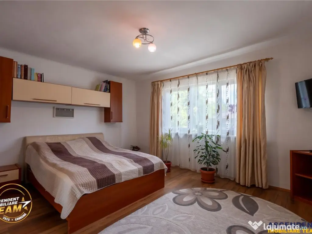 FILM! Pe 1.200mp teren rezidenta cu gradina inflorata,aproap 