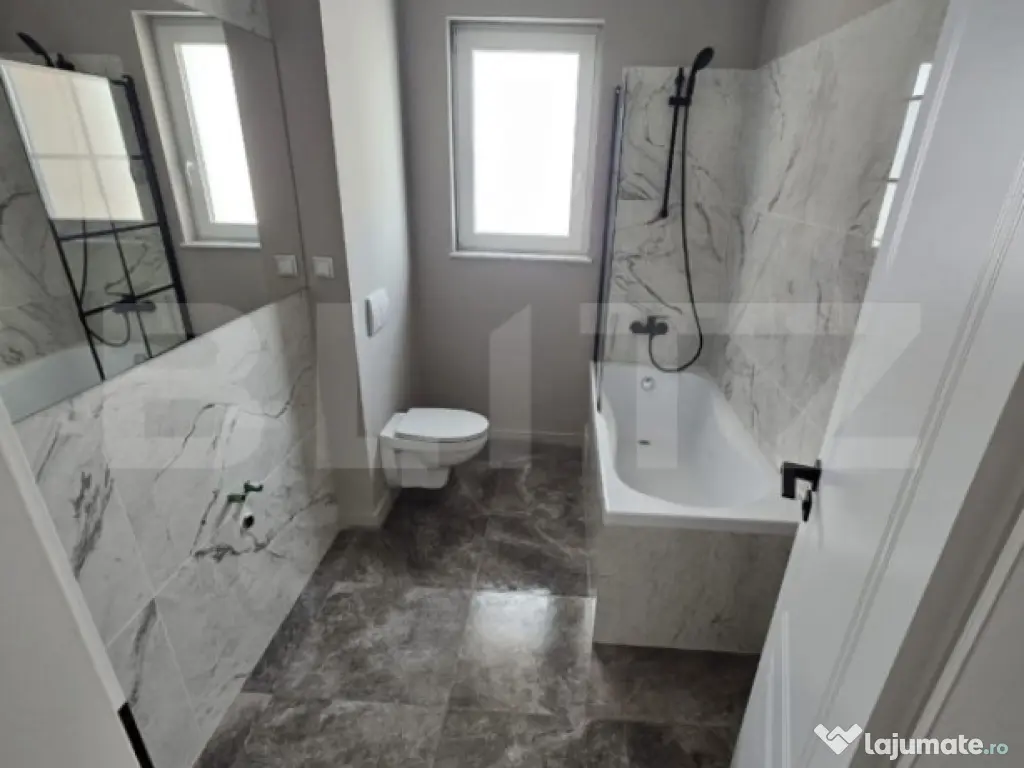 Apartament semidecomandat, 57 mp, bucatarie mobilata, parcar 