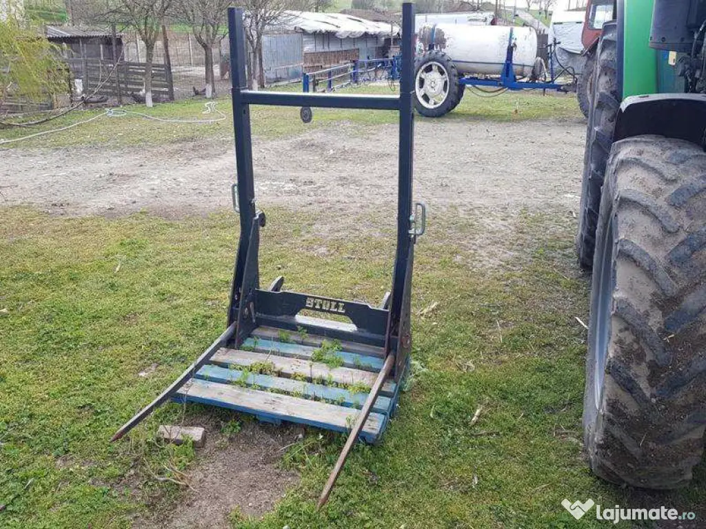 Tractor si plug reversibil