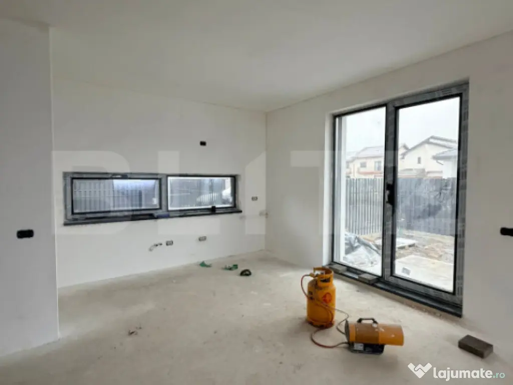 Casă individuală în Sânpetru 4 camere, tavane 3 m, geamu 