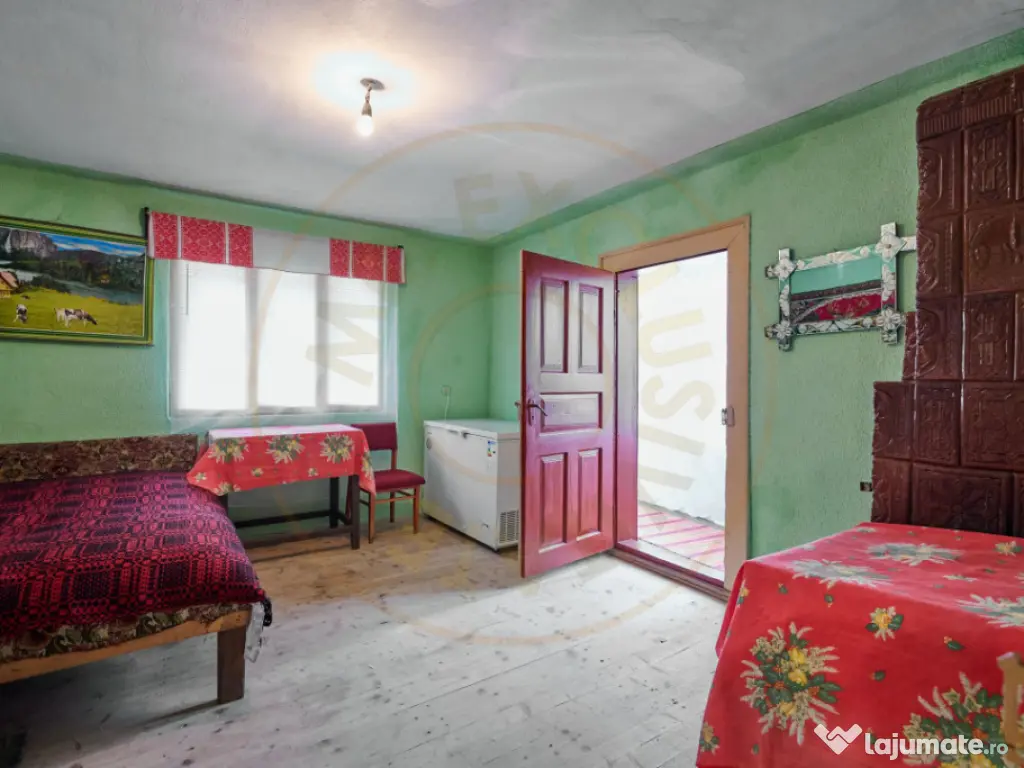 Casa la munte cu teren generos in Com. Nucsoara, loc. Slat 