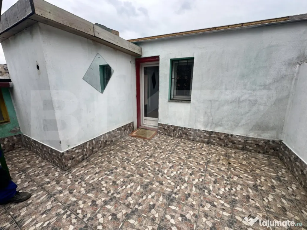 Apartament de locuit + atelier auto + terasa și curte gener 