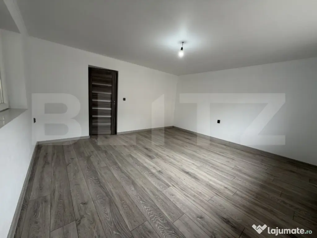 Casă cu 2 camere și un teren de 1000 mp 