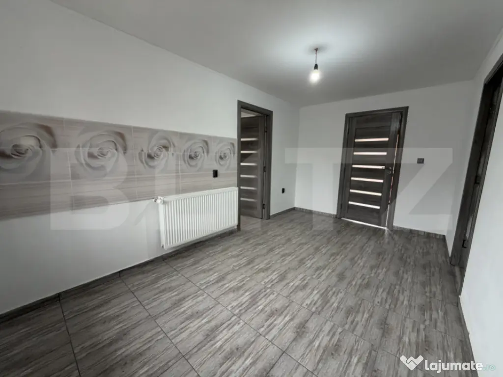 Casă cu 2 camere și un teren de 1000 mp 