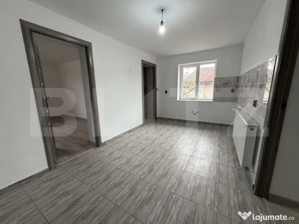 Casă cu 2 camere și un teren de 1000 mp 