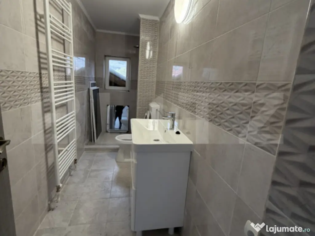 Casă cu 2 camere și un teren de 1000 mp 