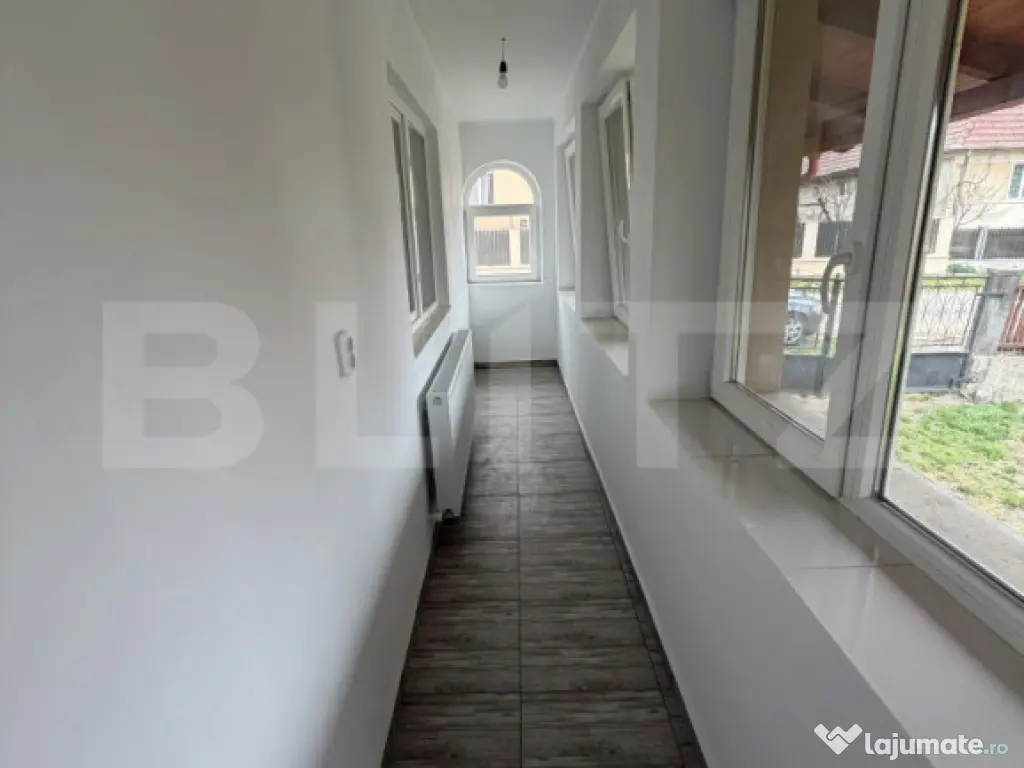 Casă cu 2 camere și un teren de 1000 mp 