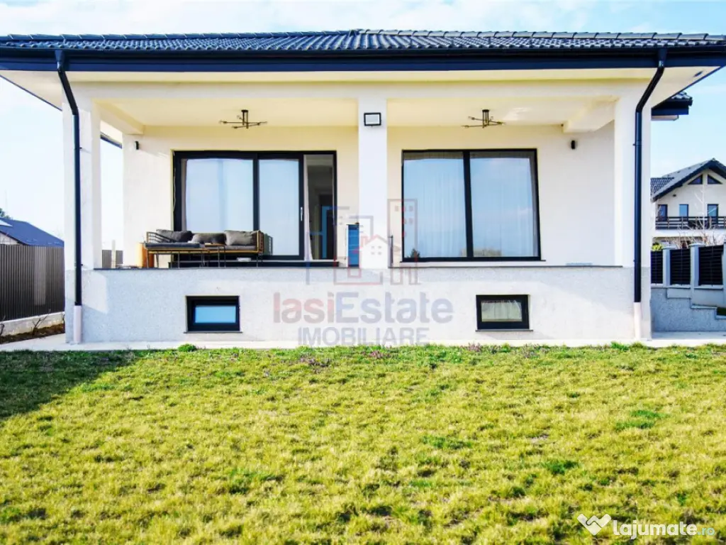 Casa intr-o zona linistita cu garaj si teren-1091 mp 