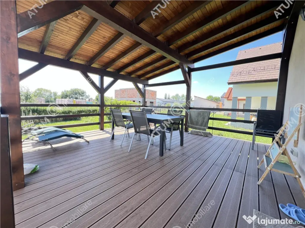 Casa individuala cu 4 camere terasa si teren 500 mp in Sura 