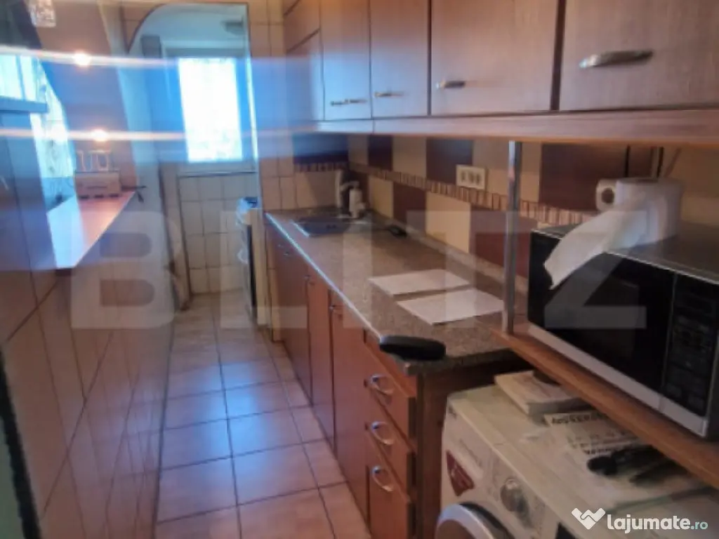 Garsoniera mobilata, etaj intermediar, parcare, beci luminoa