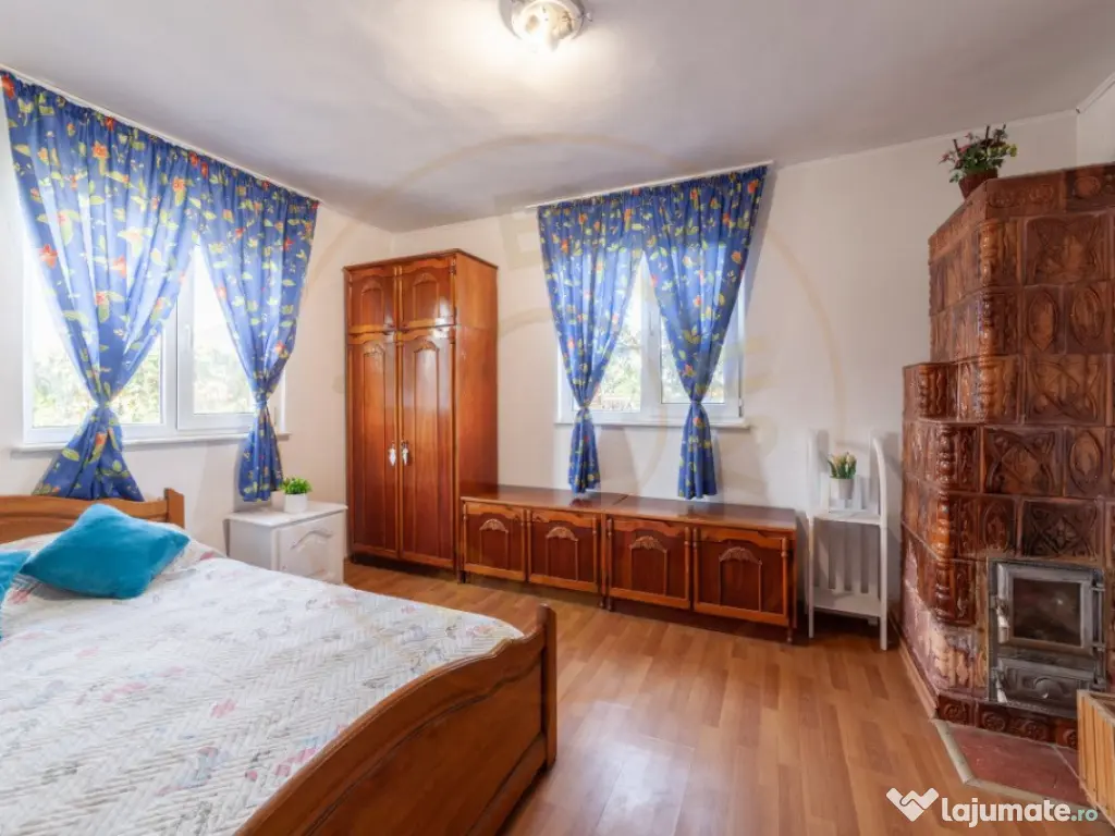 Casa cu teren generos si gradina spectaculoasa – Comuna Cu