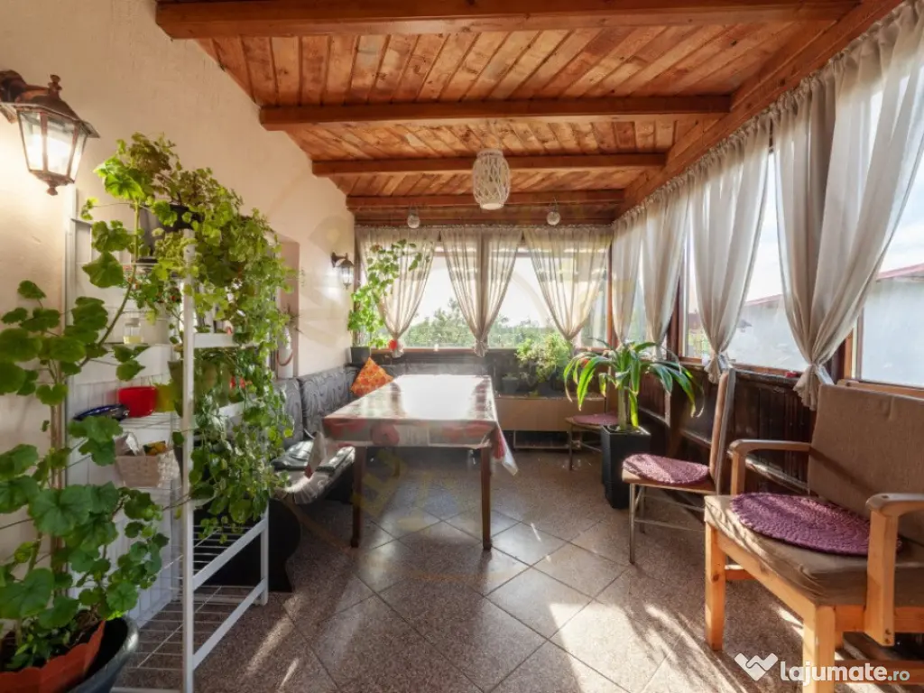 Casa cu teren generos si gradina spectaculoasa – Comuna Cu