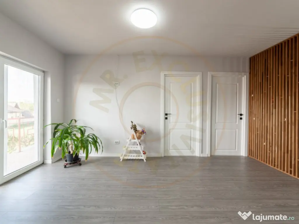 Casa cu teren generos si gradina spectaculoasa – Comuna Cu