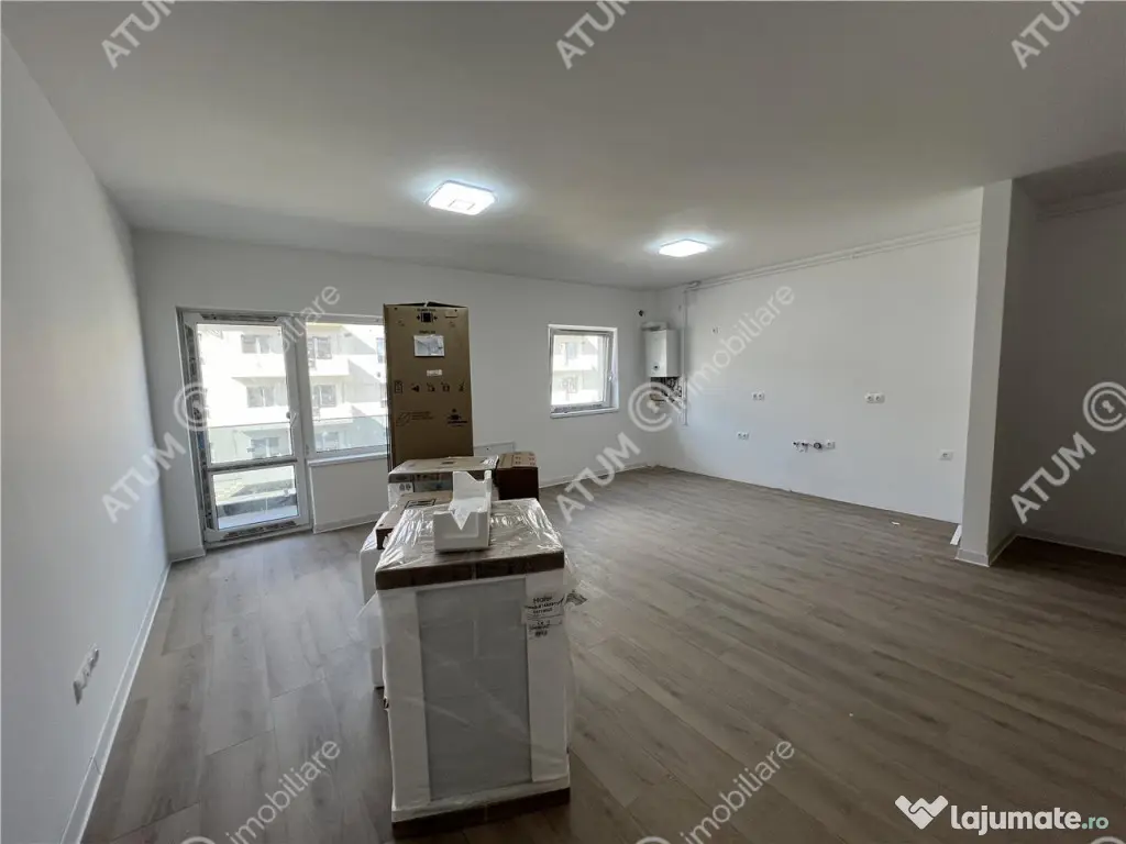 Apartament cu 3 camere 2 bai si balcon etaj 1 zona Doamna St