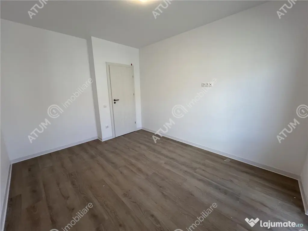 Apartament cu 3 camere 2 bai si balcon etaj 1 zona Doamna St 