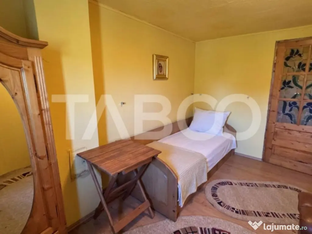 Casa de vanzare 6 camere loc de relaxare garaj teren 669 mp