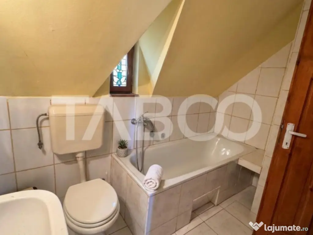 Casa de vanzare 6 camere loc de relaxare garaj teren 669 mp