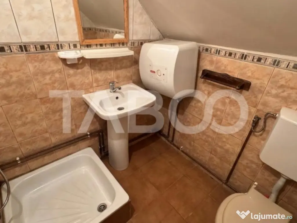 Casa de vanzare 6 camere loc de relaxare garaj teren 669 mp