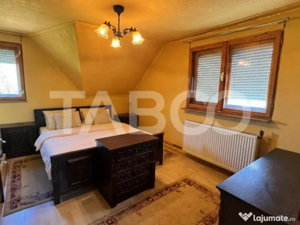Casa de vanzare 6 camere loc de relaxare garaj teren 669 mp