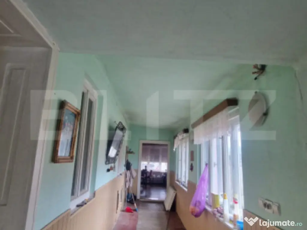 Casa 4 camere 1150 mp teren, la asfalt toate utilitatiile 