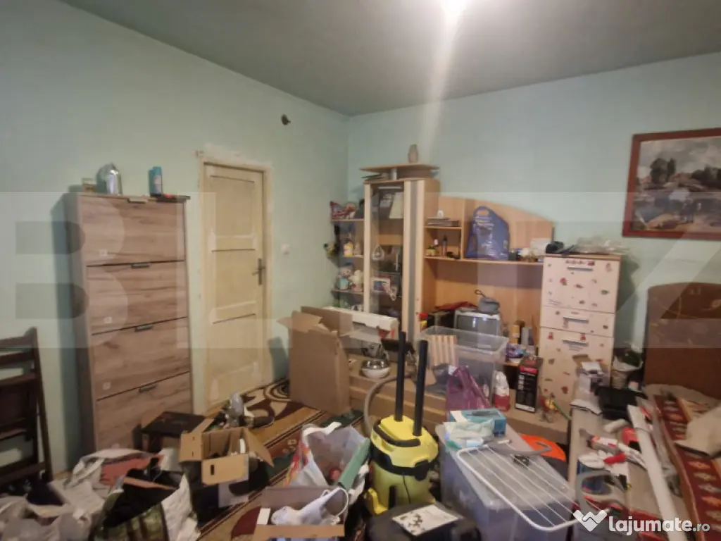 Casa 4 camere 1150 mp teren, la asfalt toate utilitatiile 