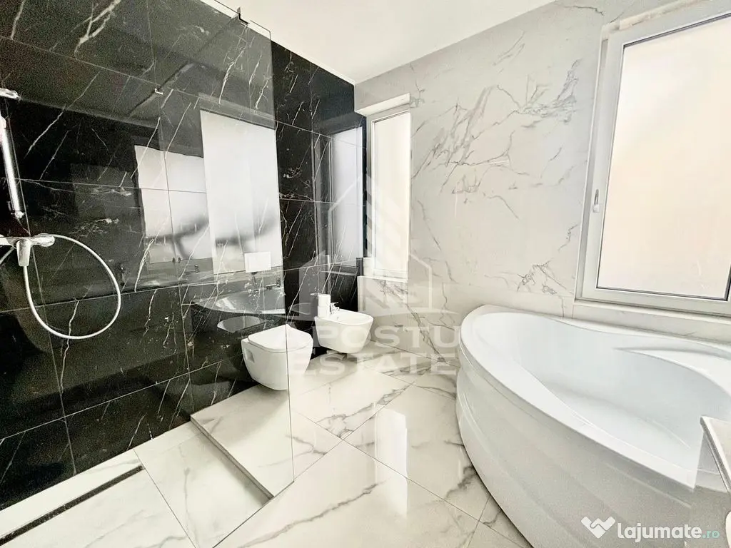 Casa individuala cu 5 camere si 4 bai in Giroc la asfalt. 