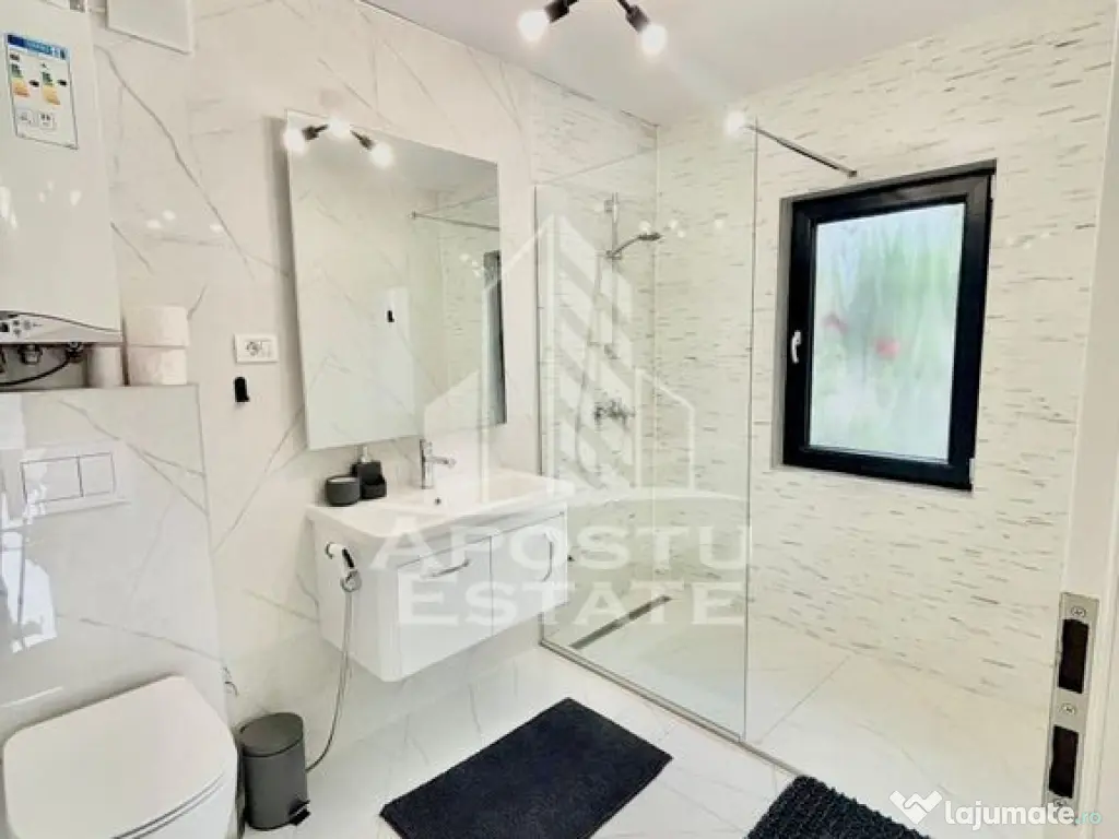 Casa individuala cu 5 camere si 4 bai in Giroc la asfalt. 