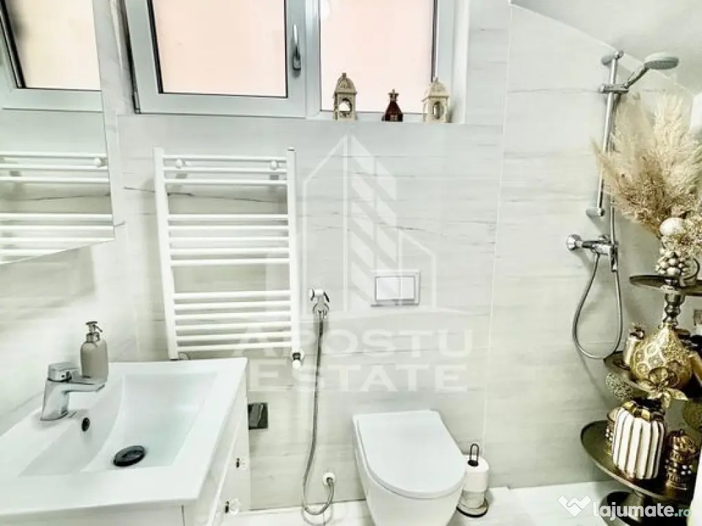 Casa individuala cu 5 camere si 4 bai in Giroc la asfalt. 