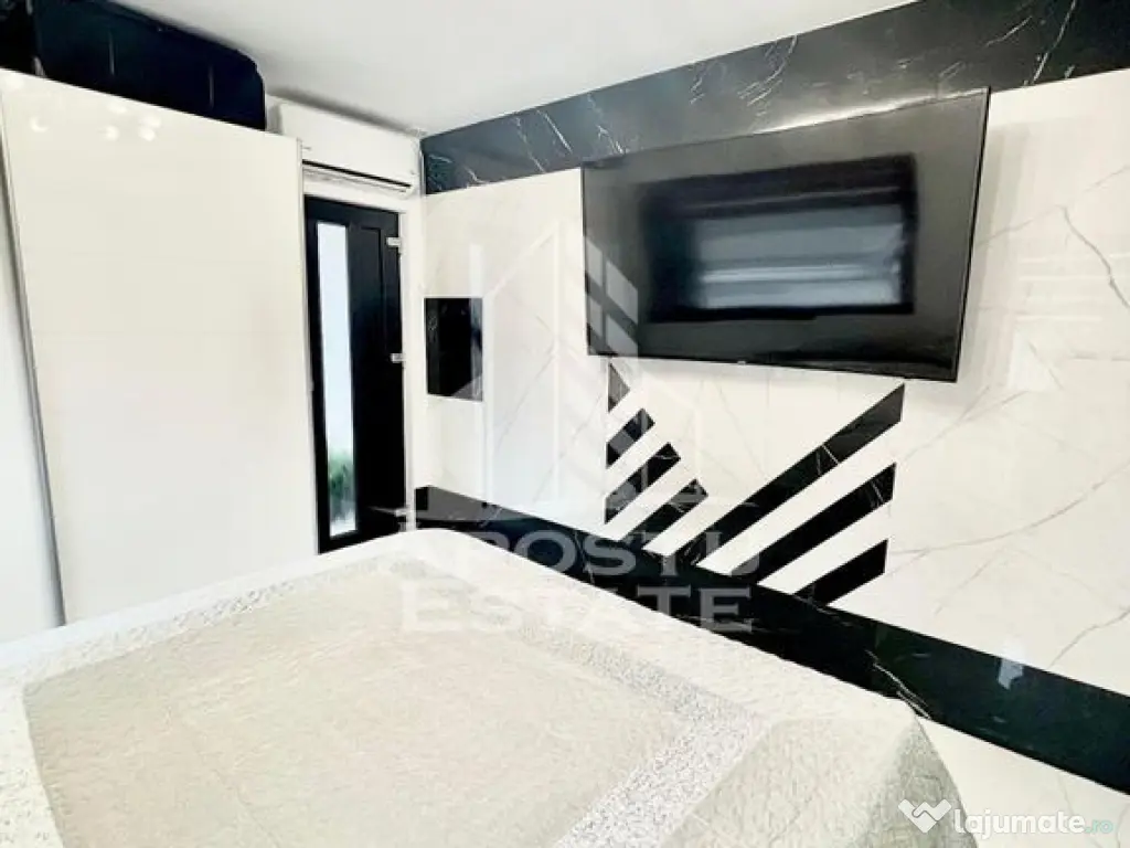 Casa individuala cu 5 camere si 4 bai in Giroc la asfalt. 