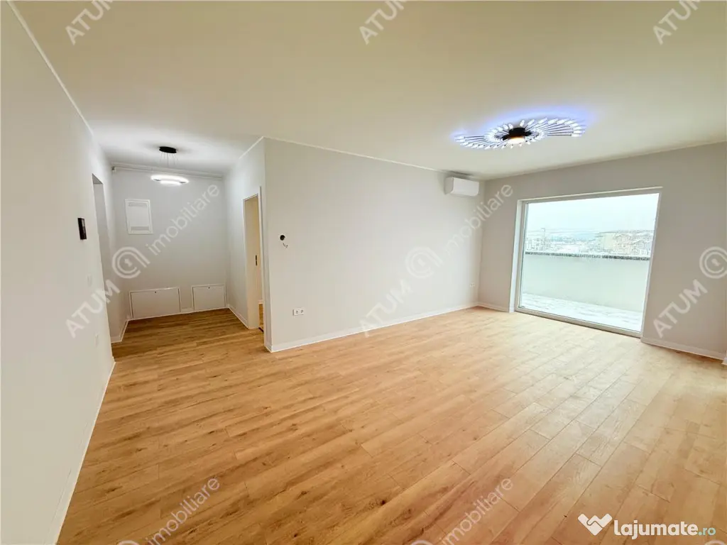 Apartament cu 3 camere terasa 40 mp 85 mp utili si 2 locuri