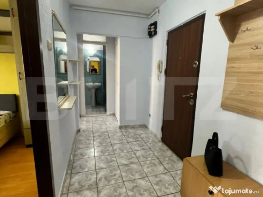 Apartament 2 camere, decomandat, etaj 2, zona Stefan Cel Mar