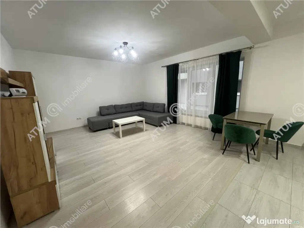 Apartament de 2 camere mobilat si utilat cu loc de parcare i