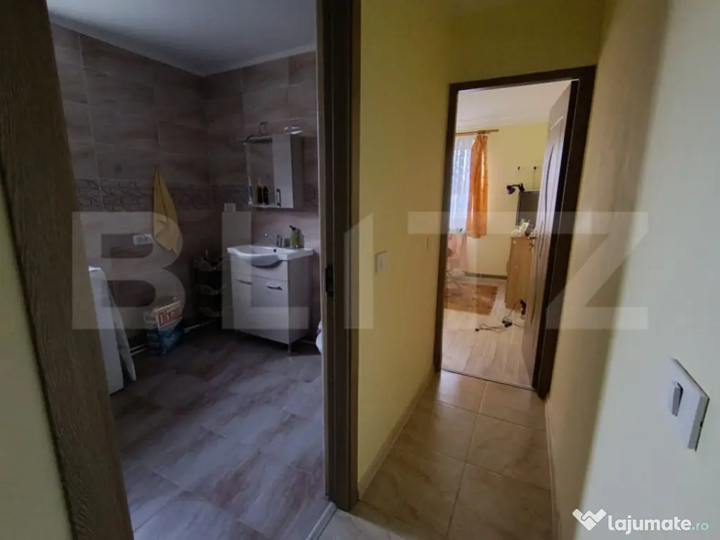 Casa cu 3 camere,baie, bucatarie, teren 500 mp 