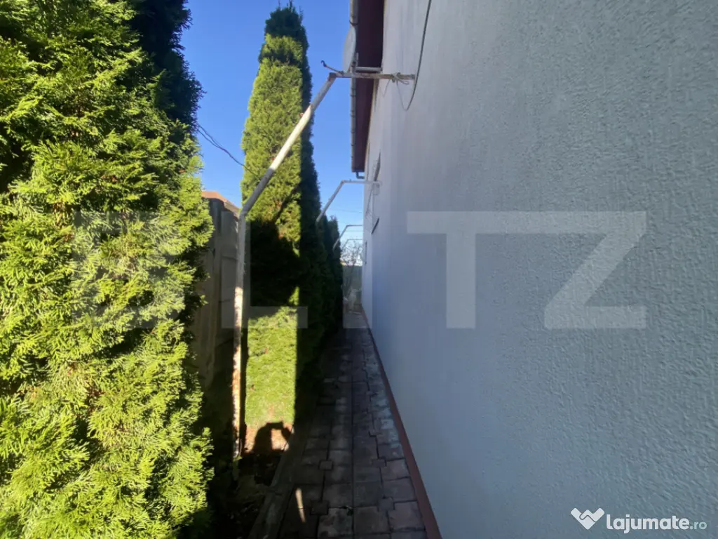 Casă spațioasă 350 mp utili, curte amenajată și garaj 