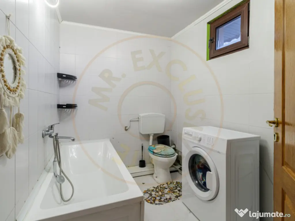 Casa 3 camere Dragomiresti strada principala 