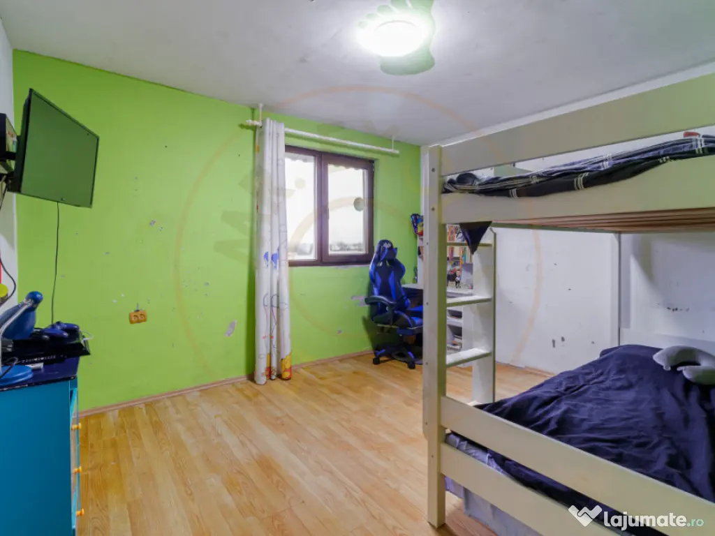 Casa 3 camere Dragomiresti strada principala 