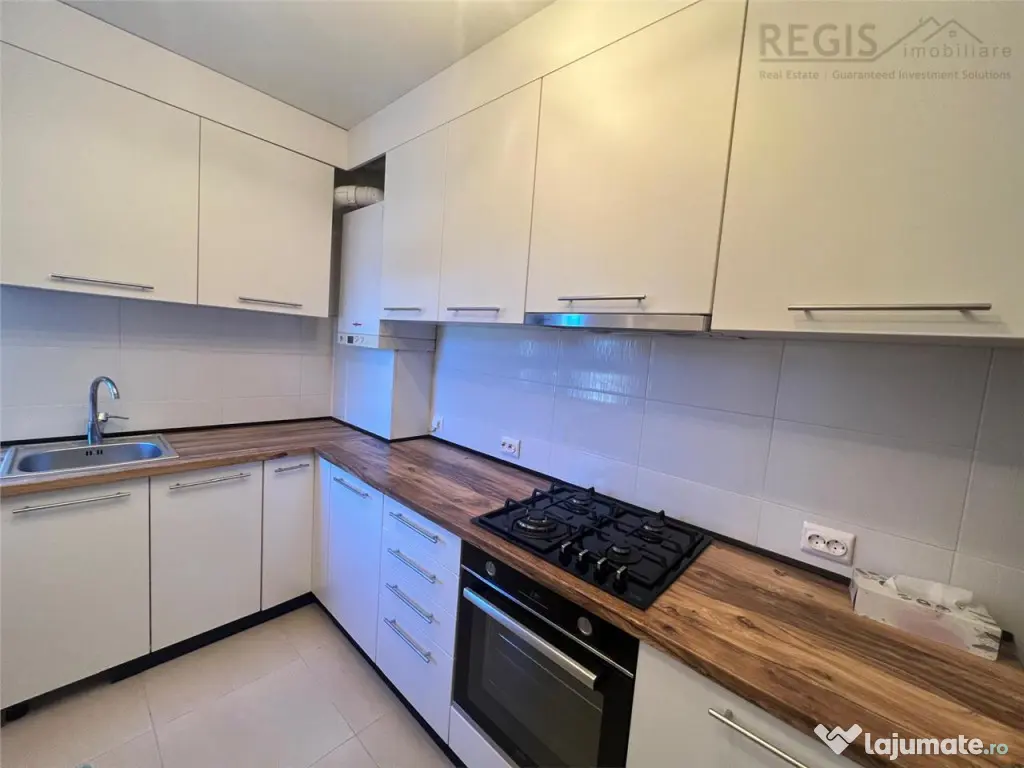 Apartament 3 camere Tractoru cu gradina proprie si loc de pa 