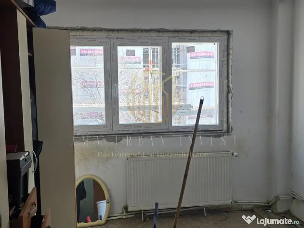 2 camere zona Titan circa 13 de politie 