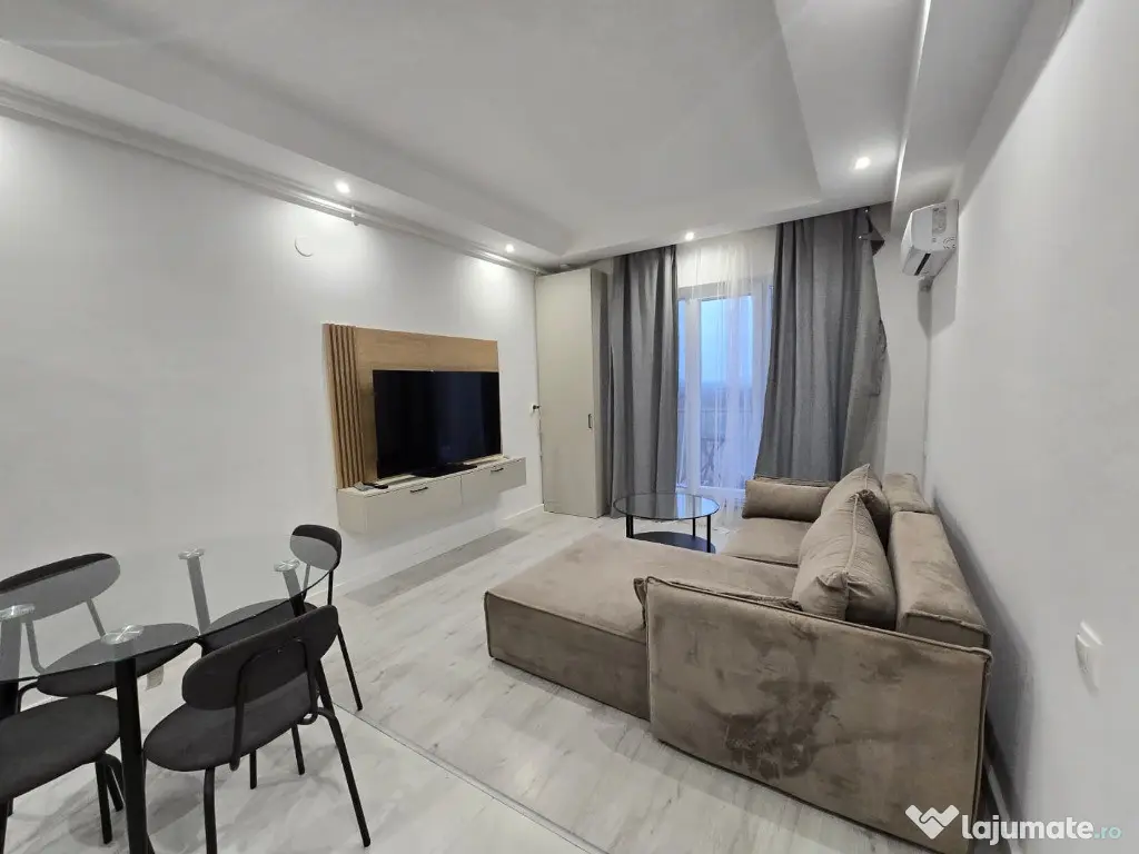 COSMOPOLIS - Apartament 2 camere tip Studio, mobilat si utilat 