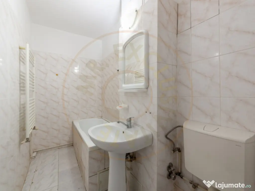 Apartament Topoloveni - 3 camere, decomandat, parter 