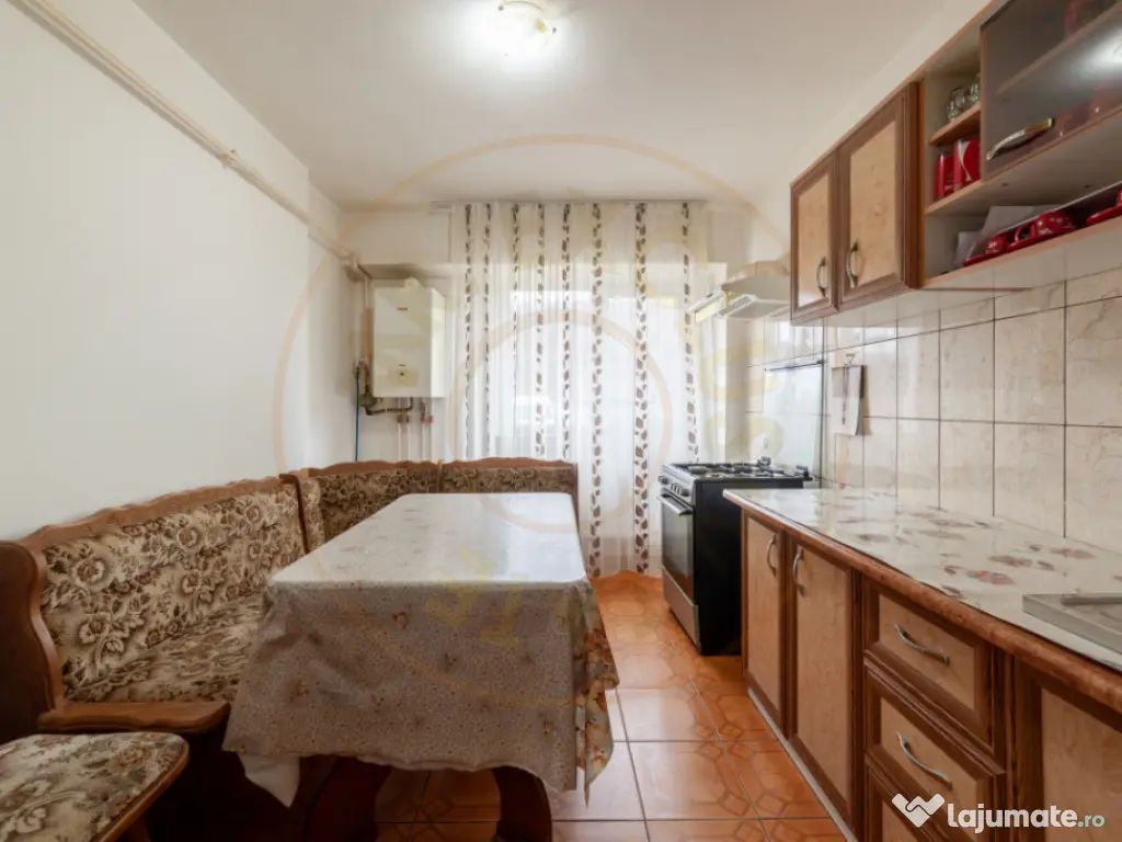 Apartament Topoloveni - 3 camere, decomandat, parter 