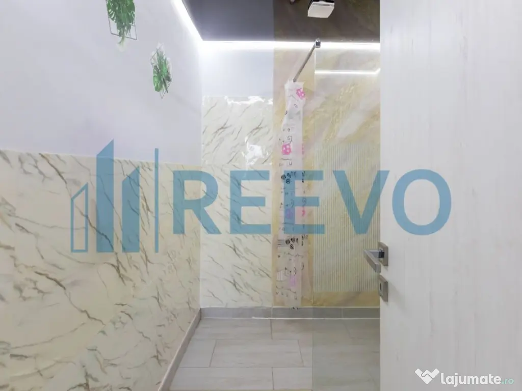 Clădire și teren de investiție, central Roman 